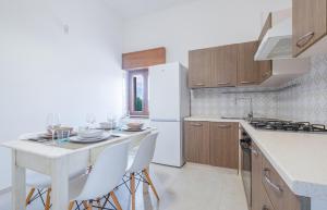 A kitchen or kitchenette at Villa Crigiada Luxury Pool