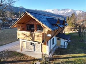 a house with solar panels on top of it at Goiserer Chalet in Bad Goisern