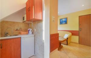 Η κουζίνα ή μικρή κουζίνα στο Gorgeous Aparthotel In Pogorzelica