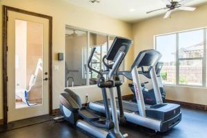 a gym with two tread machines and a mirror at Coral Ridge Oasis 30 Mins From Zion NP 2 Pools in Washington