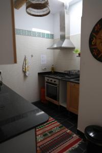 A kitchen or kitchenette at Casa corasol, a cozy, comfy, 2BR house- panoramic view and rooftop