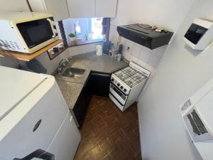 Cucina o angolo cottura di Departamento amoblado Nueva Córdoba