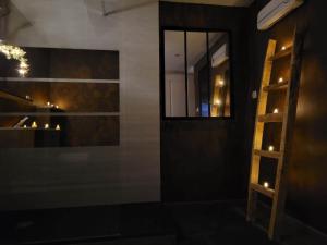 a room with a mirror and a wooden shelf at HORIZON SPA in Samer +14 photos