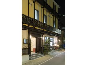 an empty street in front of a building at Kusatsu Onsen 326 Yamanoyu Hotel - Vacation STAY 10465v in Kusatsu +21 photos