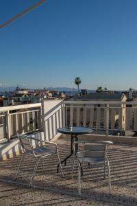En balkong eller terrasse på CityCenter Apartment
