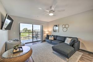 a living room with a couch and a table at Resort-Style Lake Havasu City Condo with Pool! in Lake Havasu City