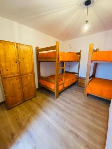 Postel nebo postele na pokoji v ubytování Flying Dog Hostel Cusco