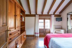 Łóżko lub łóżka w pokoju w obiekcie Excepcional Casa El Olivo