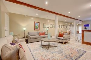 a living room with a couch and a table at The Charleston Chestnut Mansion in Charleston