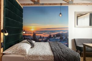 Postel nebo postele na pokoji v ubytování Mumlava Resort Harrachov