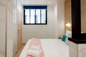 Posteľ alebo postele v izbe v ubytovaní White diamond calme rue Vaugelas
