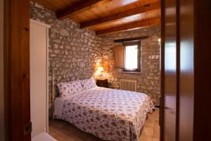 Posteľ alebo postele v izbe v ubytovaní Mas Riera - 1 + 17 fotografií