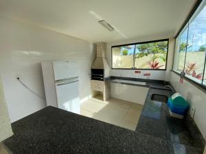 A kitchen or kitchenette at Casa de Praia Refúgio