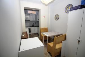 Kuchyň nebo kuchyňský kout v ubytování Rooms Luisa