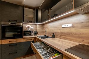 Kuchyňa alebo kuchynka v ubytovaní Apartmány Lucie