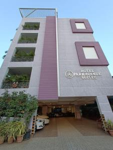 a building with a sign that reads house and dynamic service suites at Park Avenue Suites in Coimbatore