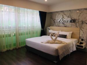 Katil atau katil-katil dalam bilik di Siam Best Inn