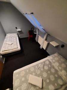 Postel nebo postele na pokoji v ubytování Hotel Boršičanka
