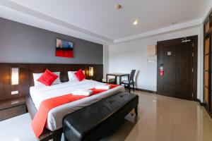 Postel nebo postele na pokoji v ubytování Ratana Hotel Sakdidet, PHUKET TOWN