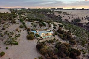 an aerial view of a house on a island in the water at Little Cuttlefish on Kangaroo Island in Penneshaw