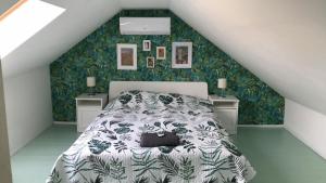 Posteľ alebo postele v izbe v ubytovaní Gólyásház apartman