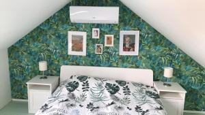 Posteľ alebo postele v izbe v ubytovaní Gólyásház apartman