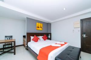 Postel nebo postele na pokoji v ubytování Ratana Hotel Sakdidet, PHUKET TOWN