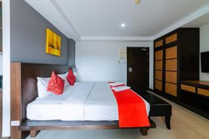 Postel nebo postele na pokoji v ubytování Ratana Hotel Sakdidet, PHUKET TOWN