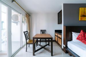 Postel nebo postele na pokoji v ubytování Ratana Hotel Sakdidet, PHUKET TOWN