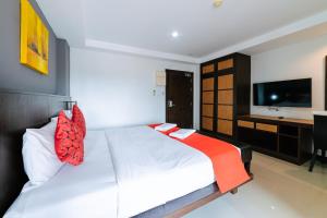 Postel nebo postele na pokoji v ubytování Ratana Hotel Sakdidet, PHUKET TOWN