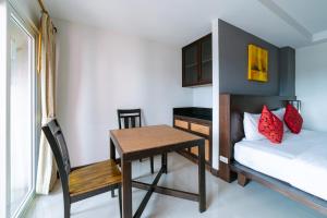 Postel nebo postele na pokoji v ubytování Ratana Hotel Sakdidet, PHUKET TOWN