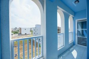 Balkón nebo terasa v ubytování Island Arch Homestay