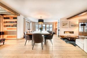 a dining room with a table and chairs at Chalet Lilly - Family and Friends by A-Appartments mit Ski in - Ski out in Zug +55 photos
