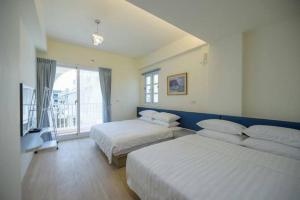 Postel nebo postele na pokoji v ubytování Island Arch Homestay + 26 fotografií