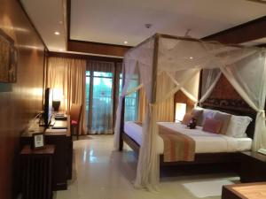 Ein Bett oder Betten in einem Zimmer der Unterkunft Bo Phut Resort and Spa - SHA Plus