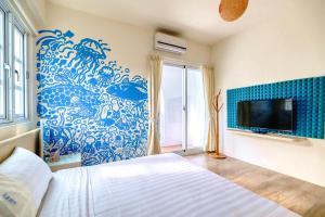 Postel nebo postele na pokoji v ubytování Island Arch Homestay