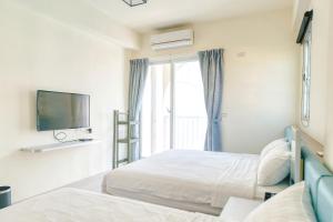 Postel nebo postele na pokoji v ubytování Island Arch Homestay