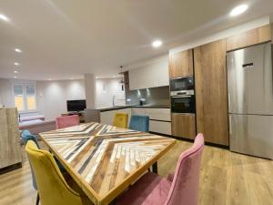 A kitchen or kitchenette at Mk77 - Gran Via