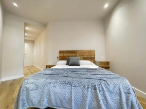 A bed or beds in a room at Mk77 - Gran Via