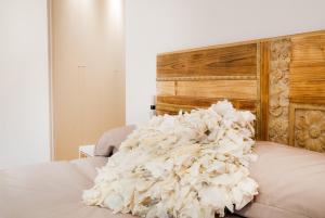 A bed or beds in a room at Mk77 - Gran Via