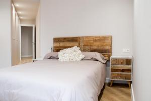 A bed or beds in a room at Mk77 - Gran Via
