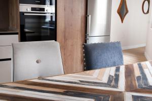 A kitchen or kitchenette at Mk77 - Gran Via