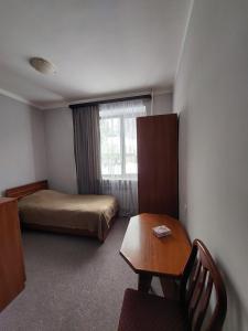 Voodi või voodid majutusasutuse University Hotel Tsakhkadzor toas