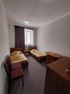 Voodi või voodid majutusasutuse University Hotel Tsakhkadzor toas