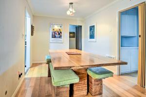 a dining room with a wooden table and chairs at Santa Monica Townhome - Close to Beach! in Los Angeles