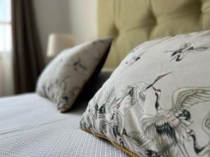 Posteľ alebo postele v izbe v ubytovaní FTV Holidays Homes