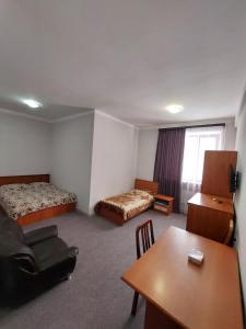 Voodi või voodid majutusasutuse University Hotel Tsakhkadzor toas