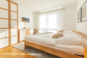 Postel nebo postele na pokoji v ubytování Daheim & Unterwegs
