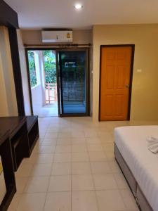 Postel nebo postele na pokoji v ubytování Du-sila Hotel kohchang