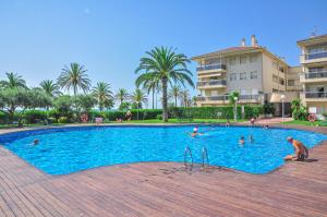 a large swimming pool with people in it at Golf D 201 ONLY FAMILIES in Cambrils